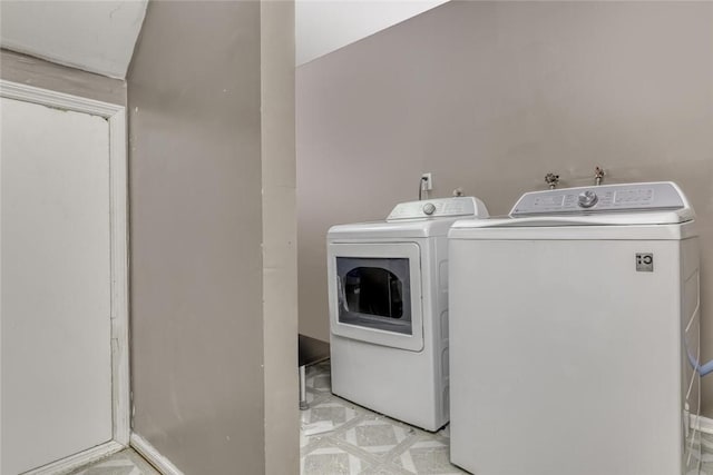 laundry room featuring independent washer and dryer