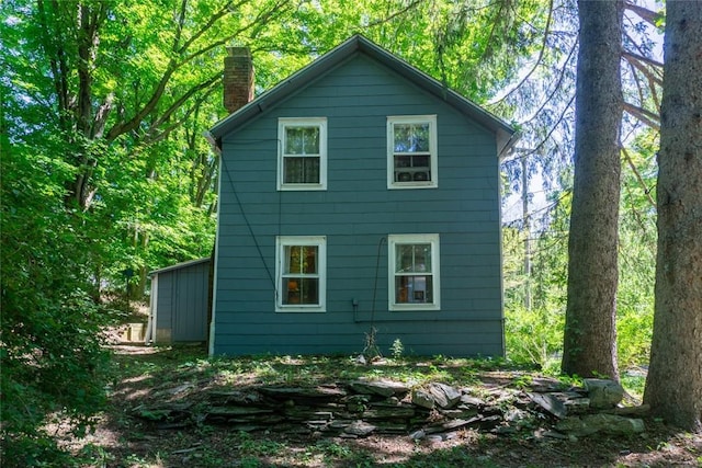 721 County Rte 7, Pine Plains, NY 12567 - back of house featuring a chimney