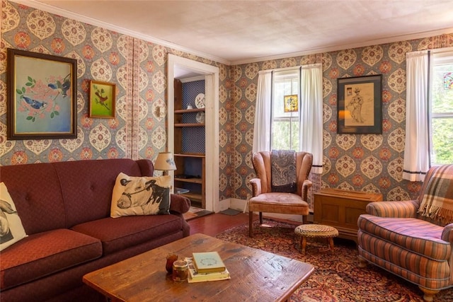 living room with crown molding and hardwood / wood-style floors