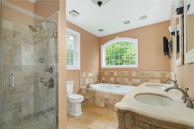 full bathroom with tile patterned floors, toilet, sink, and plus walk in shower