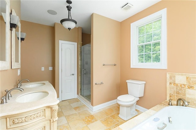 full bathroom with separate shower and tub, vanity, and toilet