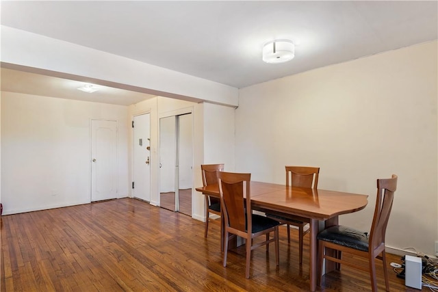 dining area featuring hardwood / wood-style floors