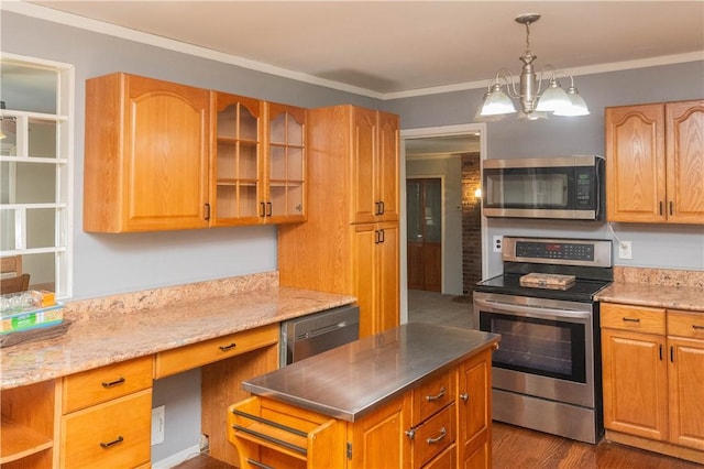 kitchen featuring ornamental molding, stainless steel appliances, and a chandelier