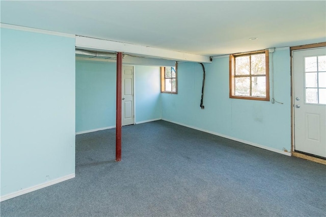 basement with dark carpet