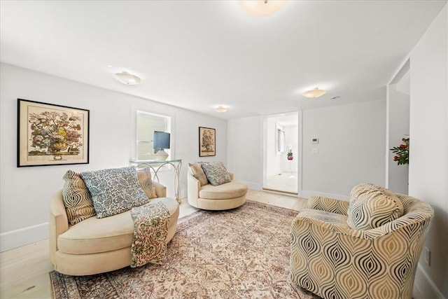 living room with light hardwood / wood-style floors