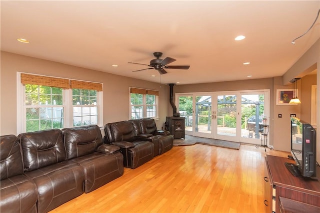 36 Boulder Dr, Cornwall, NY 12553 - living room featuring a wood stove, a ceiling fan, light wood-style flooring, recessed lighting, and french doors