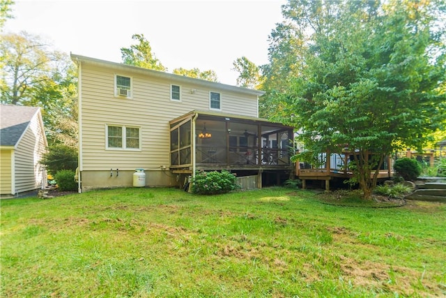 36 Boulder Dr, Cornwall, NY 12553 - back of property featuring a sunroom, a lawn, and a wooden deck