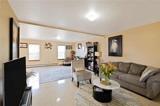 tiled living room with a baseboard heating unit