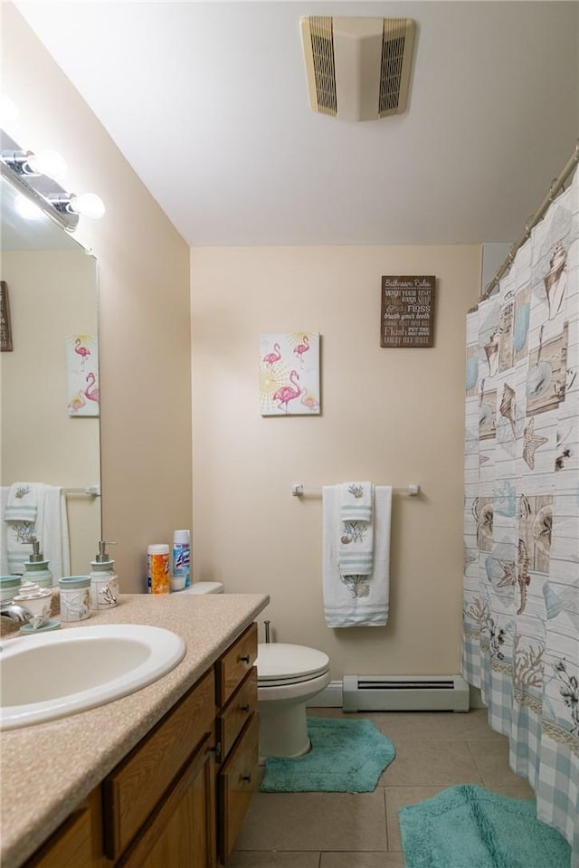 bathroom with walk in shower, tile patterned flooring, a baseboard heating unit, toilet, and vanity