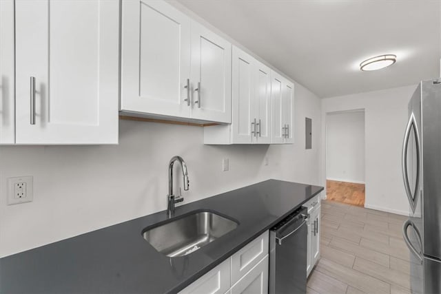 90 Union St Unit 6G, New Rochelle, NY 10805 - kitchen with white cabinets, sink, and stainless steel appliances