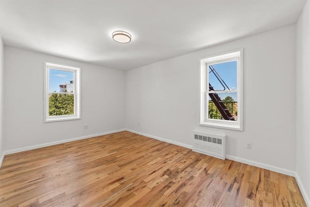 90 Union St Unit 6G, New Rochelle, NY 10805 - unfurnished room with light hardwood / wood-style floors and radiator