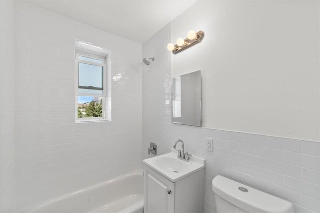 90 Union St Unit 6G, New Rochelle, NY 10805 - full bathroom featuring vanity, toilet, tile walls, and tiled shower / bath