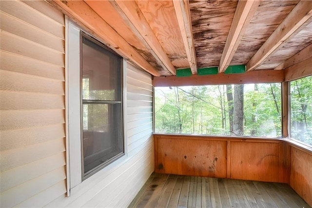 unfurnished sunroom featuring wooden ceiling