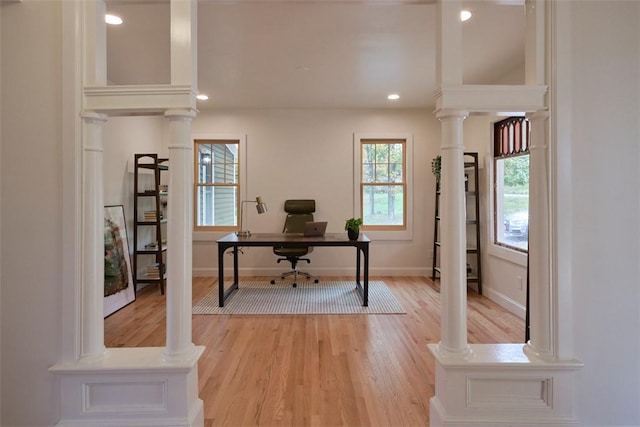 home office featuring light hardwood / wood-style floors