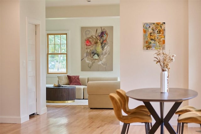 dining room with hardwood / wood-style floors