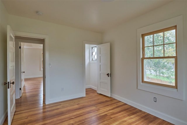 unfurnished bedroom with light hardwood / wood-style floors