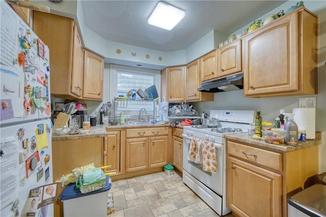 kitchen with white appliances and sink