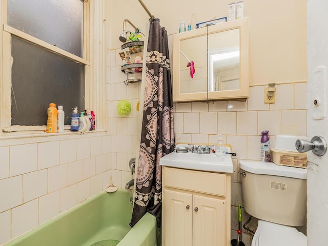 full bathroom featuring backsplash, vanity, shower / tub combo with curtain, tile walls, and toilet