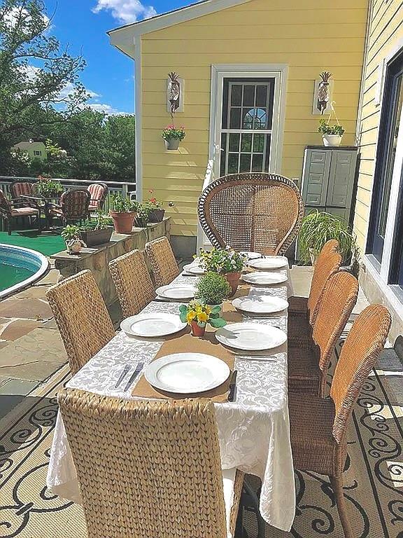 view of patio / terrace featuring a pool