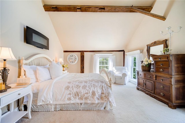 carpeted bedroom featuring beamed ceiling and high vaulted ceiling