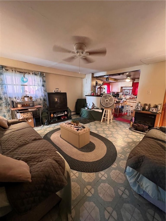 living room with ceiling fan