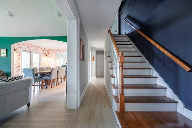 staircase featuring hardwood / wood-style flooring