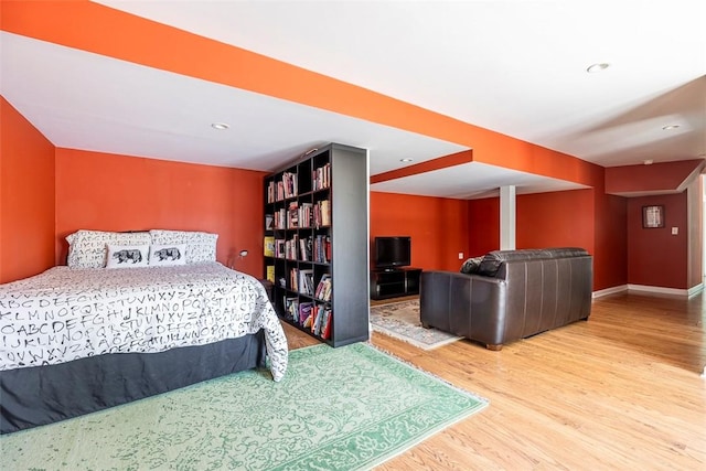 bedroom featuring hardwood / wood-style flooring