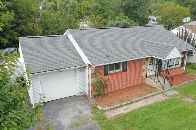 view of front of home with a garage