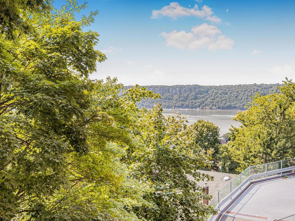 view of mountain feature featuring a water view