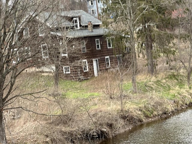 view of side of property featuring a water view