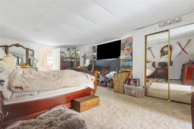 bedroom featuring a closet and carpet