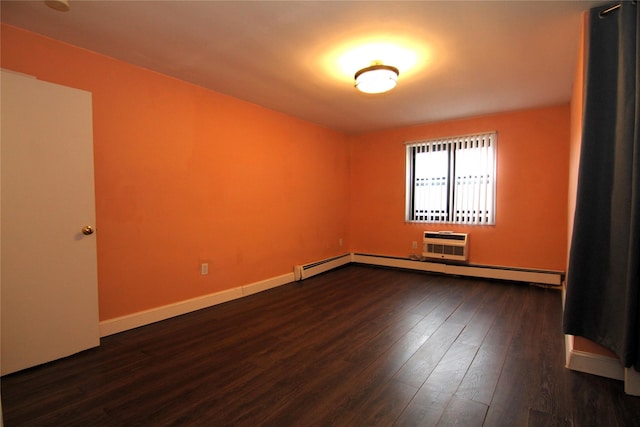 empty room with dark hardwood / wood-style flooring and an AC wall unit