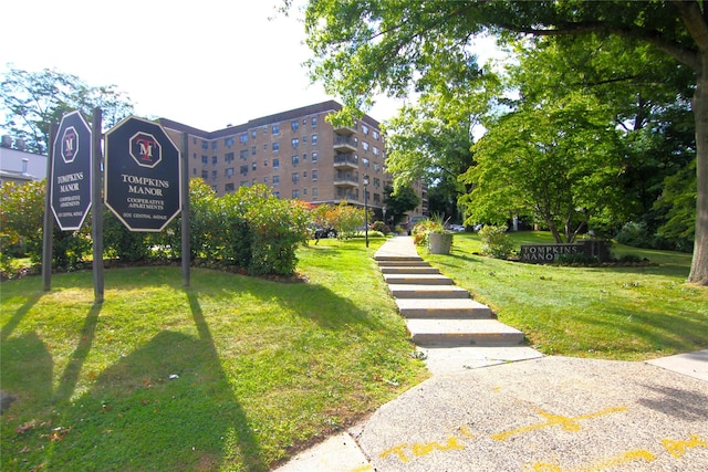 surrounding community featuring a lawn