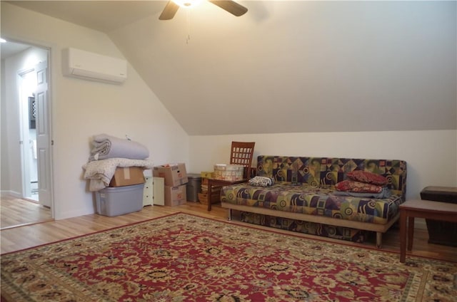 additional living space featuring wood-type flooring, vaulted ceiling, an AC wall unit, and ceiling fan