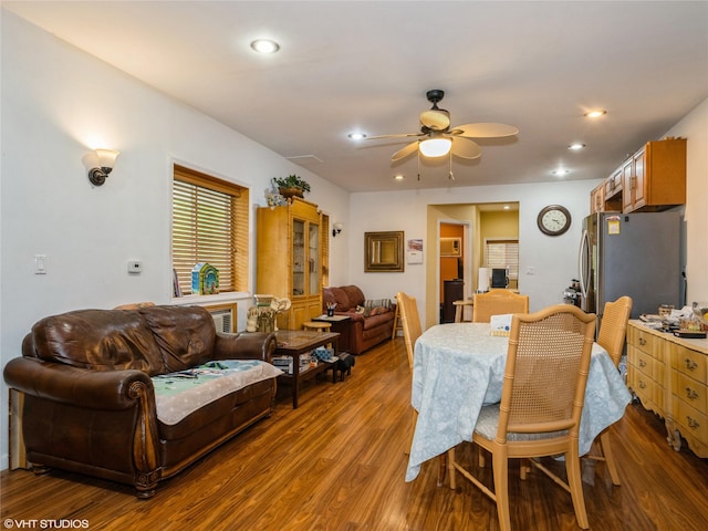 dining area with a ceiling fan, wood finished floors, and recessed lighting