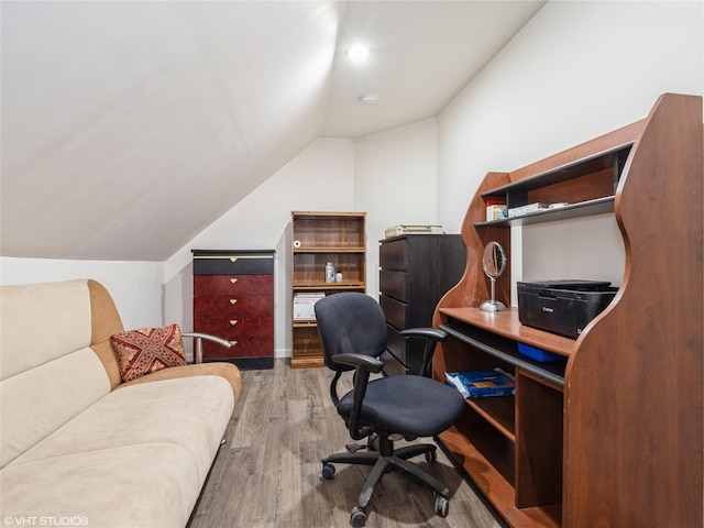 office featuring wood finished floors and vaulted ceiling