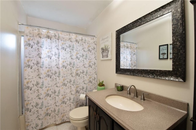 bathroom with a shower with shower curtain, vanity, toilet, and tile patterned flooring