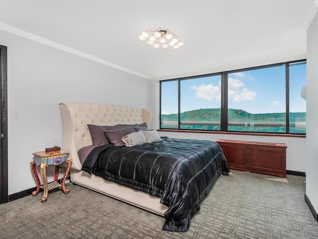 carpeted bedroom featuring a water view and ornamental molding