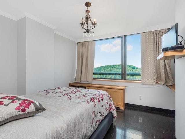 bedroom featuring dark hardwood / wood-style flooring, crown molding, and a notable chandelier