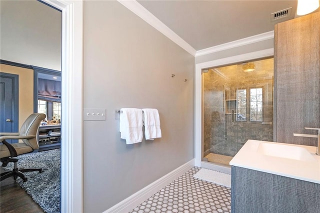 bathroom featuring crown molding