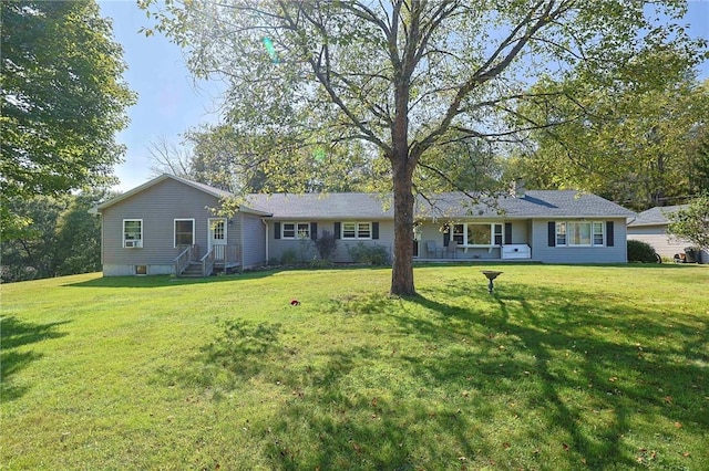 single story home with a front yard