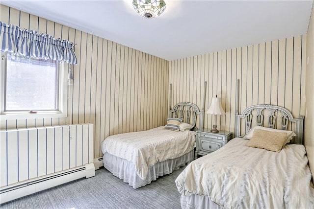 carpeted bedroom with radiator and a baseboard heating unit