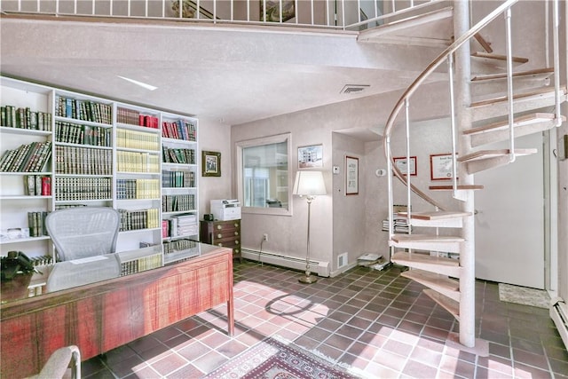 tiled home office with a baseboard heating unit