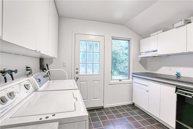 washroom with cabinets and separate washer and dryer