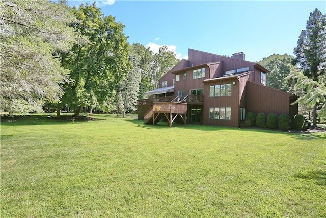 view of yard featuring a wooden deck