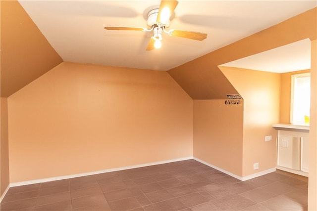 bonus room featuring ceiling fan and vaulted ceiling