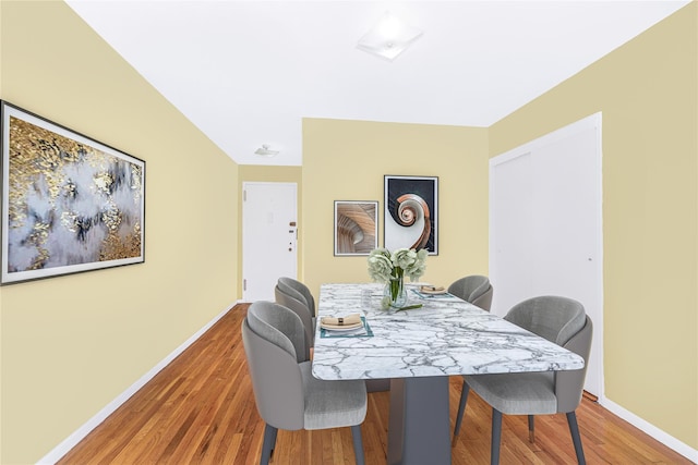 dining area featuring hardwood / wood-style floors