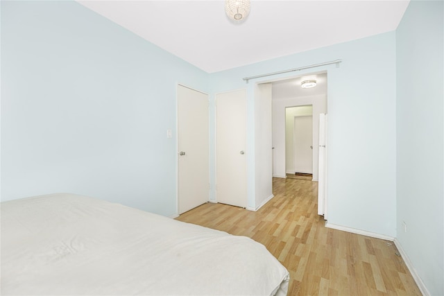 bedroom featuring light hardwood / wood-style floors