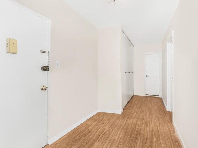 hall featuring light hardwood / wood-style flooring