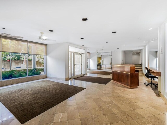 reception area featuring ceiling fan